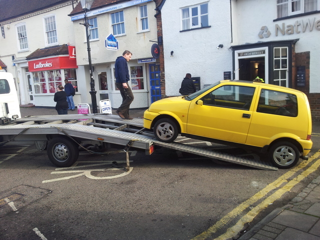 Loading the Cinquecento on to the truck.